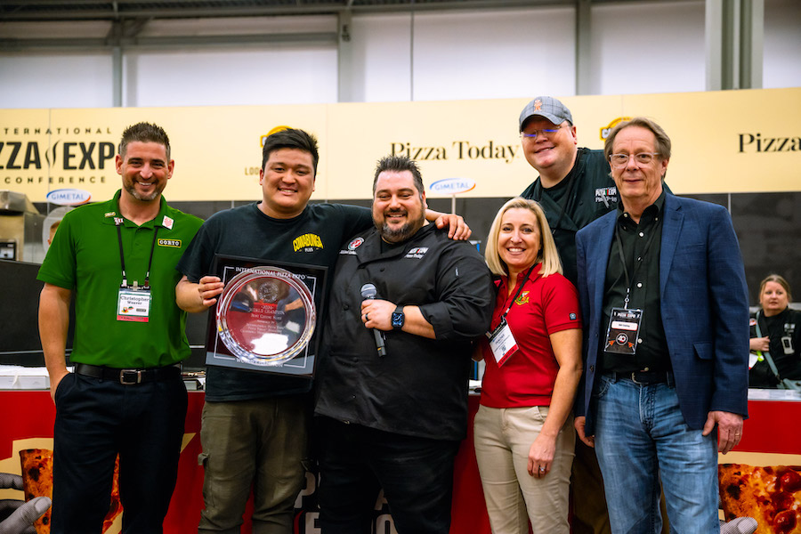 Andy Huynh, Cowabunga+, Hamilton, Ontario, Canada, wins the World's Best Cheese Slice Division at International Pizza Challenge 2024.