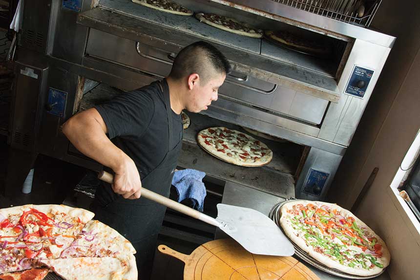 pizza maker, working oven, Empire Slice House, Oklahoma City, Oklahoma, 2018 Independent Pizzeria of the Year