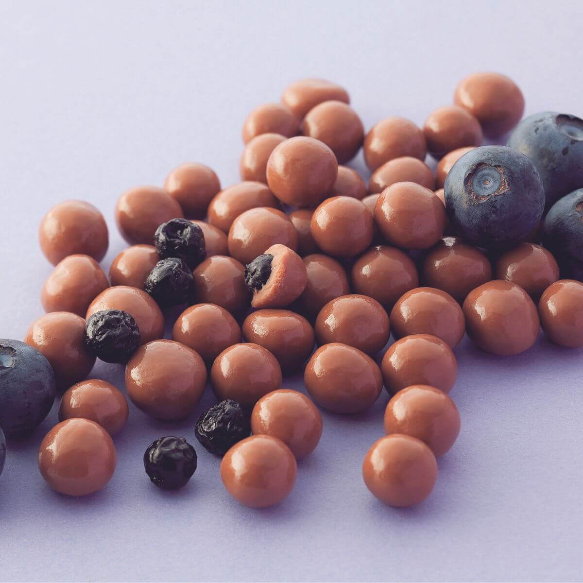 ROYCE' Chocolate - Blueberry Chocolate - Image shows round chocolate-coated blueberries.