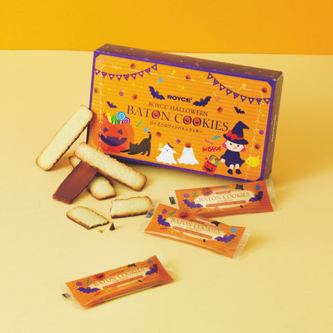 ROYCE' Chocolate - ROYCE' Halloween Baton Cookies - Image shows a printed box with accents of loose cookies. Text says ROYCE' Halloween Baton Cookies.